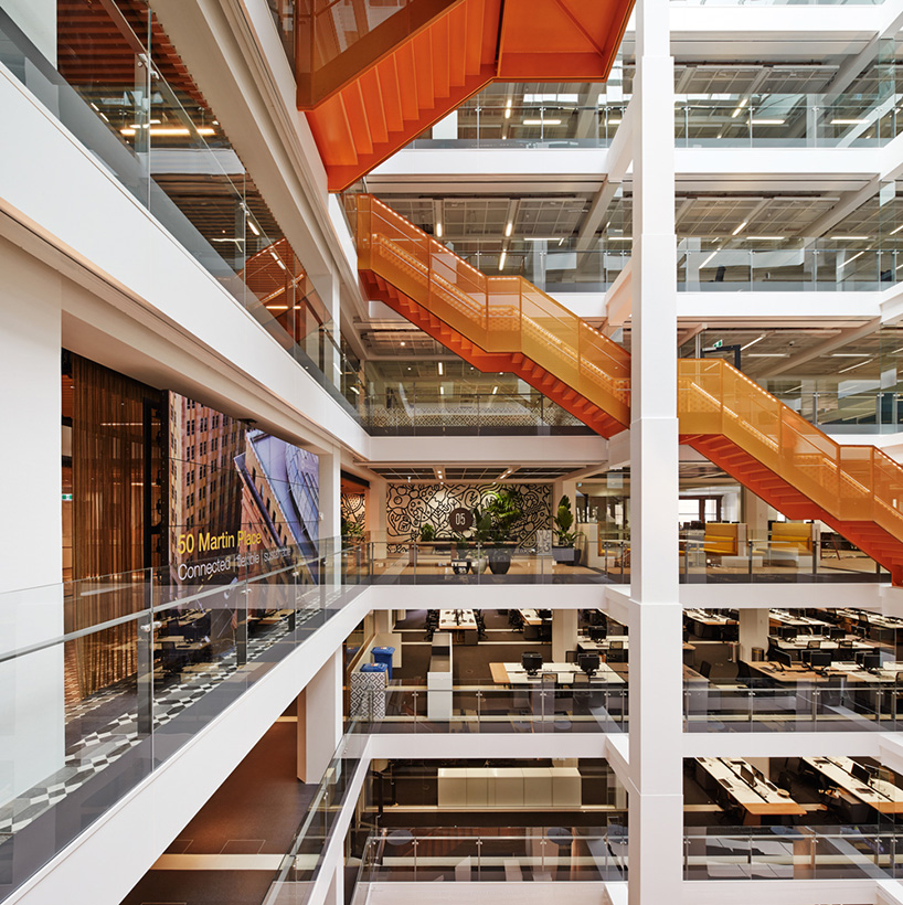 an orange staircase weaves the floors of this australian workspace together, by BVN + clive wilkinson