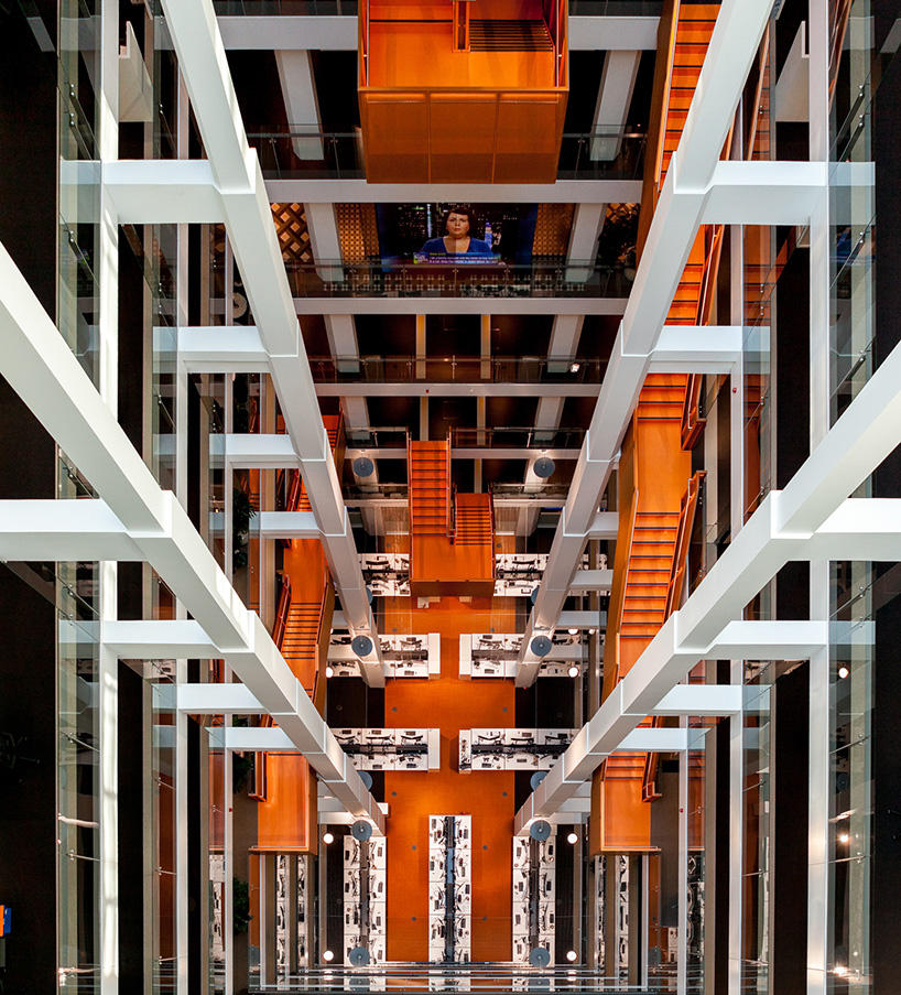 an orange staircase weaves the floors of this australian workspace together, by BVN + clive wilkinson