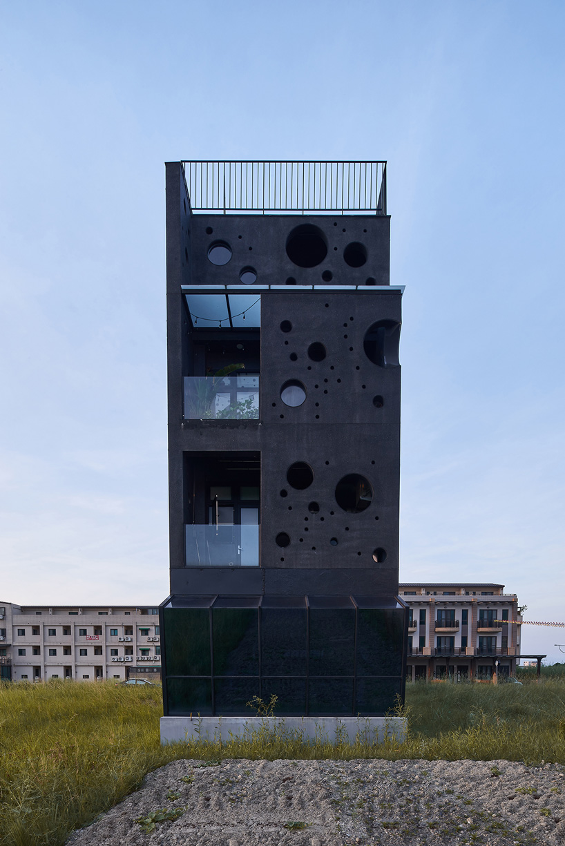 emerge architects' sea foam-inspired guesthouse in taiwan attracts passersby at night - 2