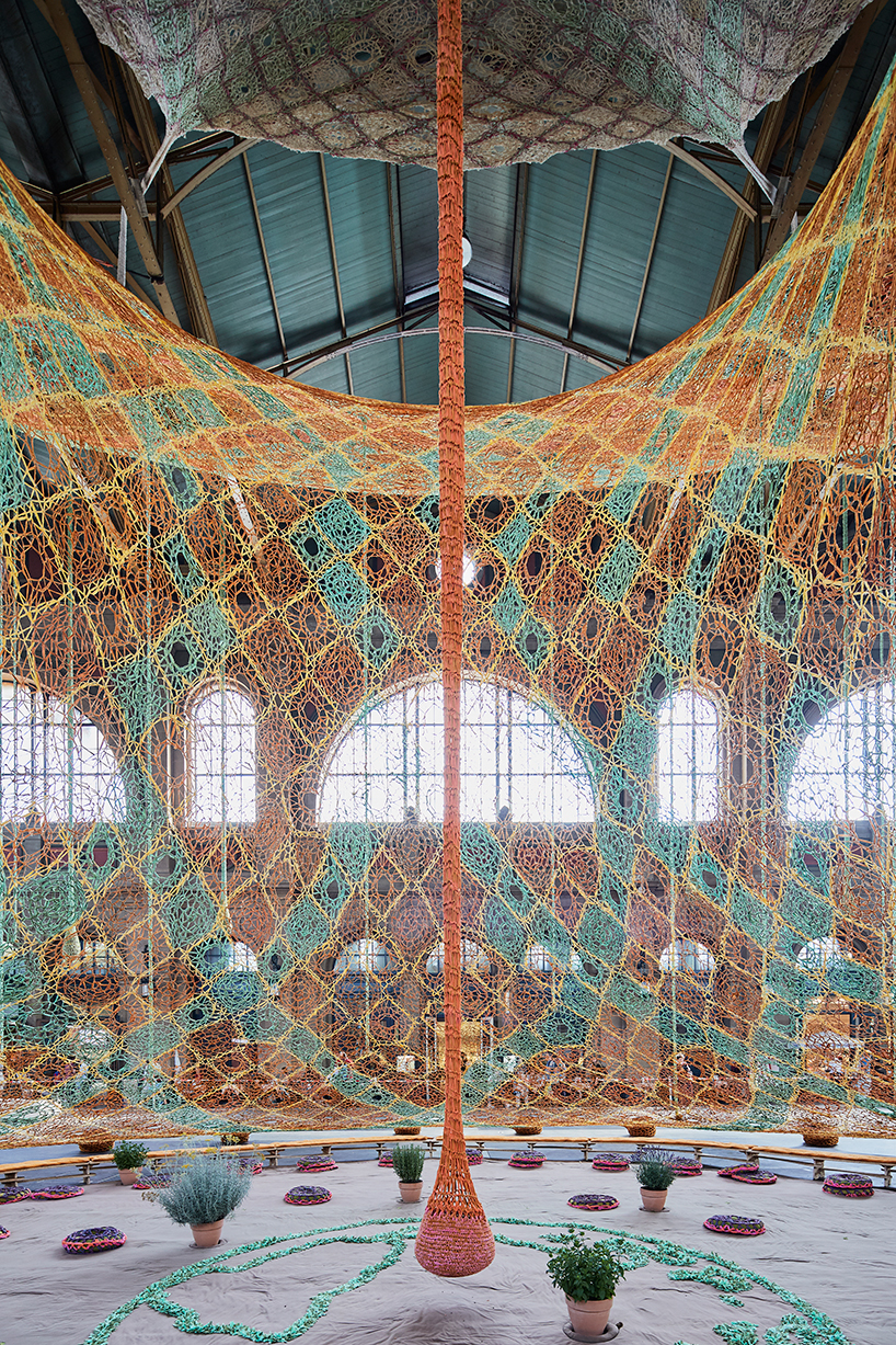 ernesto neto hand-knots monumental tree inside zurich's central station GaiaMotherTree designboom