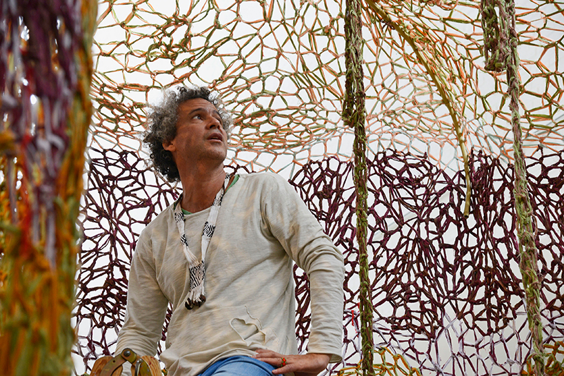 ernesto neto hand-knots monumental tree inside zurich's central station GaiaMotherTree designboom