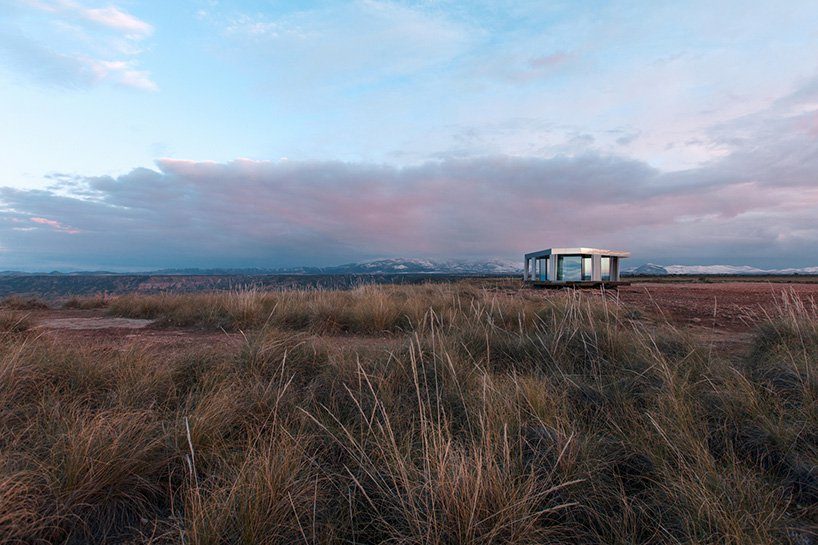 explore OFIS architects' spanish desert glass pavilion in new video