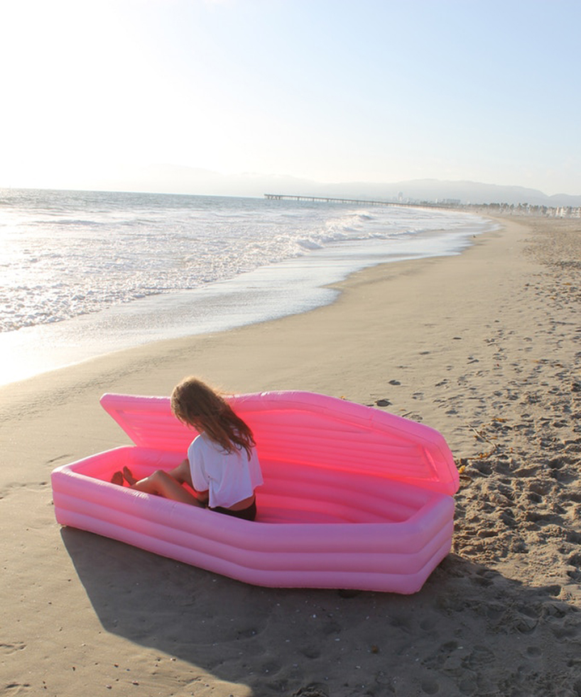 bury yourself this summer in this pink coffin float by pom pom designboom