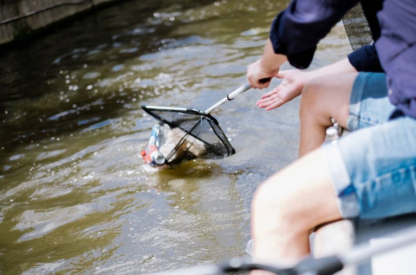 amsterdam tourists can combine sightseeing with plastic fishing on the city's canals - 2