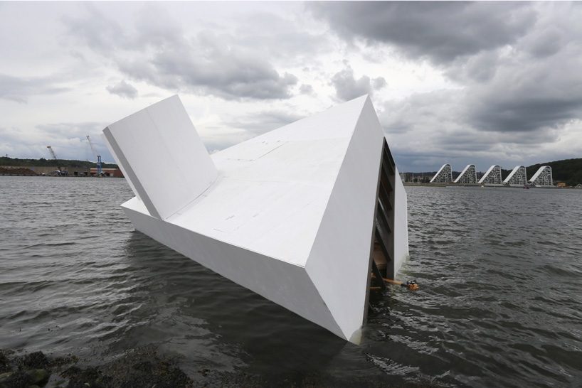 le corbusier's villa savoye floating in a danish fjord as a comment on the ‘sinking’ of modernity