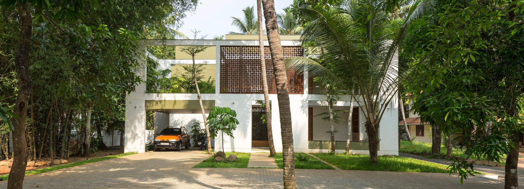 in india, LIJO RENY's 'regimented house' is immersed in nature