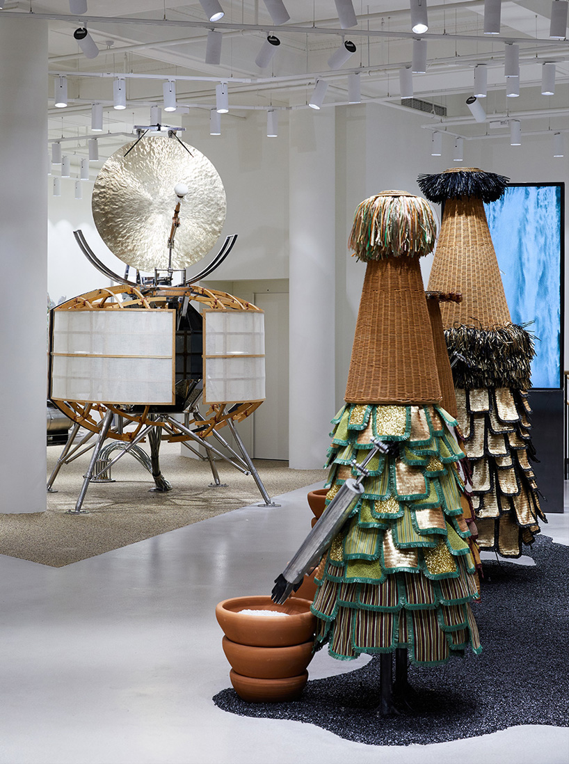 larger-than-life aliens practice their kung fu skills in the gentle monster london store