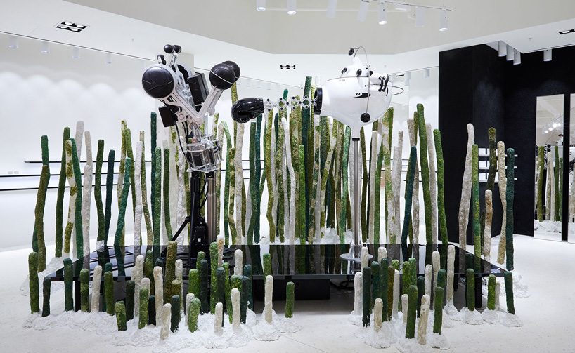 larger-than-life aliens practice their kung fu skills in the gentle monster london store