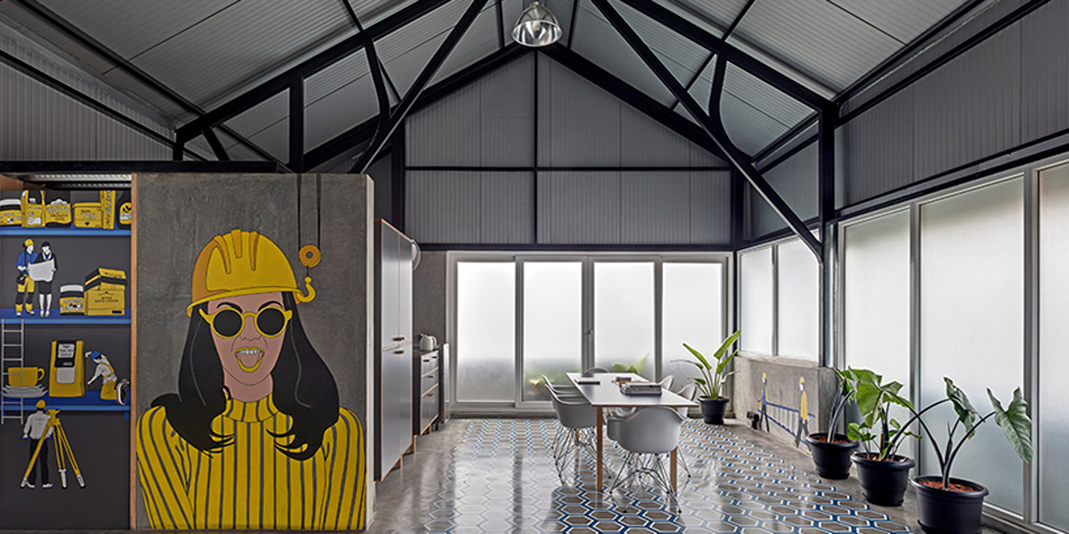 m9's studio in bangalore features colorful murals with the designers at