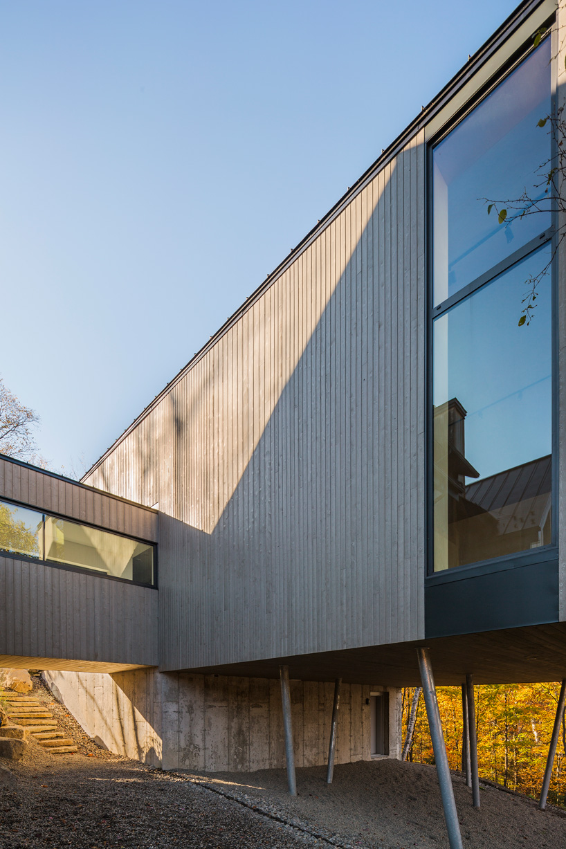 MU architecture's workshop extension hangs over a cliff in quebec