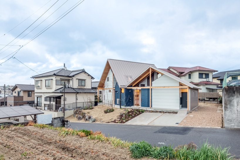 maki yoshimura frames two-volume house in japan with timber truss skeleton designboom
