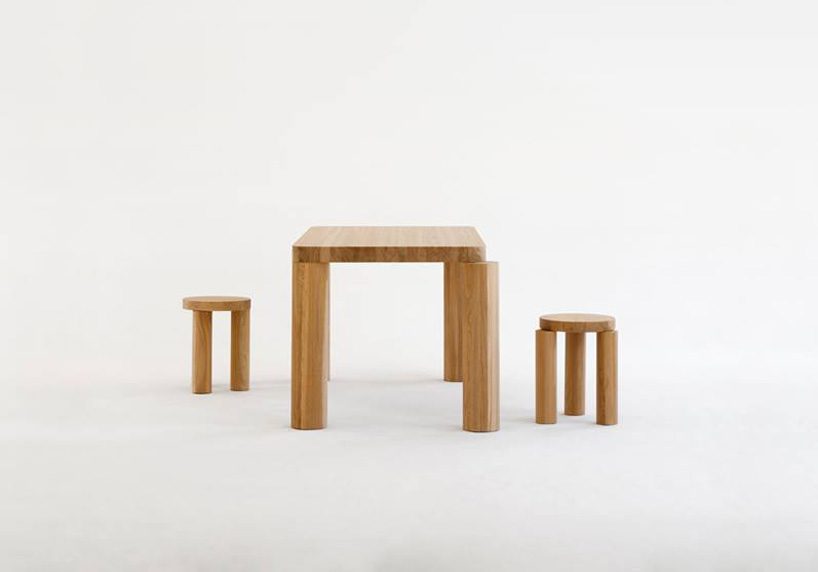 the offset dining table by philippe malouin comes with misaligned legs in solid oak designboom