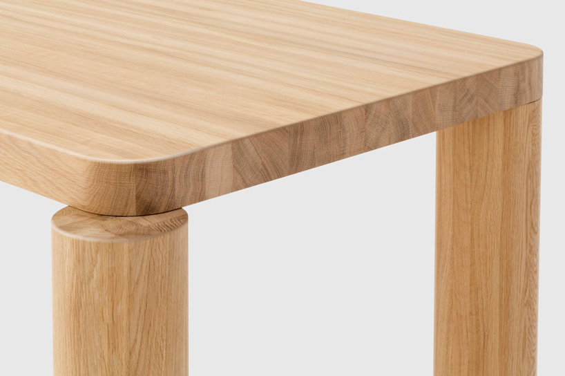 the offset dining table by philippe malouin comes with misaligned legs in solid oak designboom