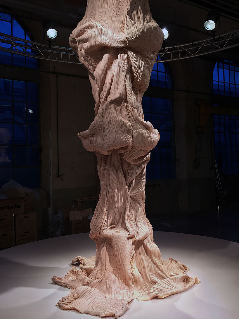 bart hess manipulates pink latex to resemble wrinkled human skin in grotto installation