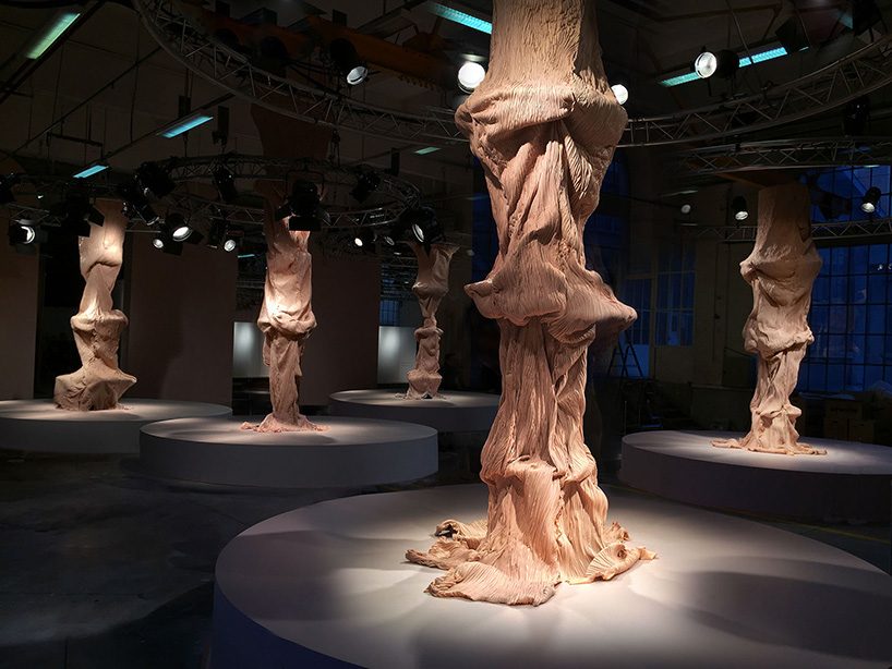 bart hess manipulates pink latex to resemble wrinkled human skin in grotto installation