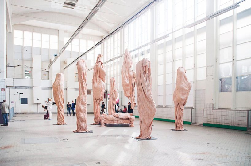 bart hess manipulates pink latex to resemble wrinkled human skin in grotto installation