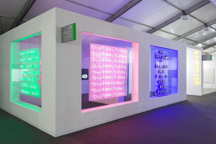 david shrigley's tongue-in-cheek neon works presented as a shopfront during frieze art fair