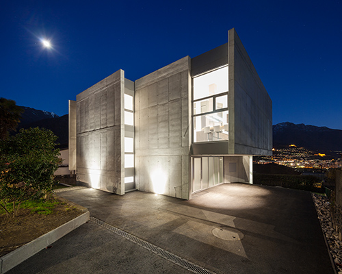 swiss house XXXIV is a collection of shifted concrete planes within an alpine landscape