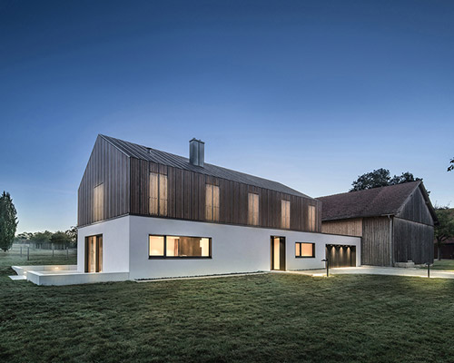 minimalistic house in southern germany by DIA merges natural and man-made