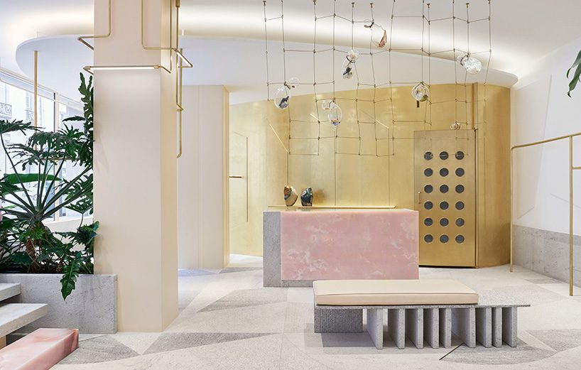 pink onyx, granite and brass take center stage at the forte forte boutique in paris