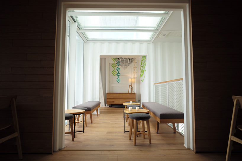 kengo kuma designs shipping container starbucks as coffee giant goes greener