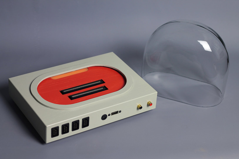 love hultén creates ultimate nintendo shrine in bell-jar inspired console