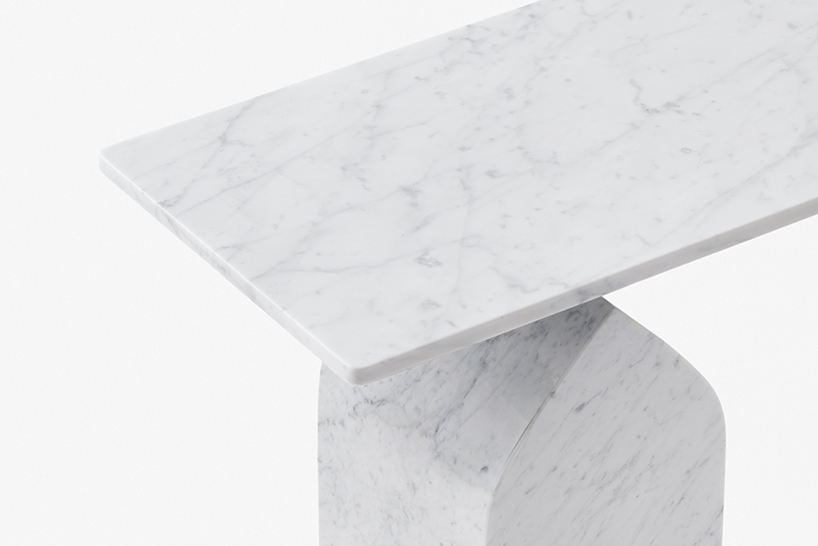 nendo's seesaw tables for marsotto edizioni softly rise up from the base designboom