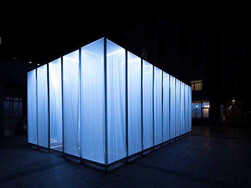 superimpose wraps beijing's CO2 pavilion in translucent white screens and smoke