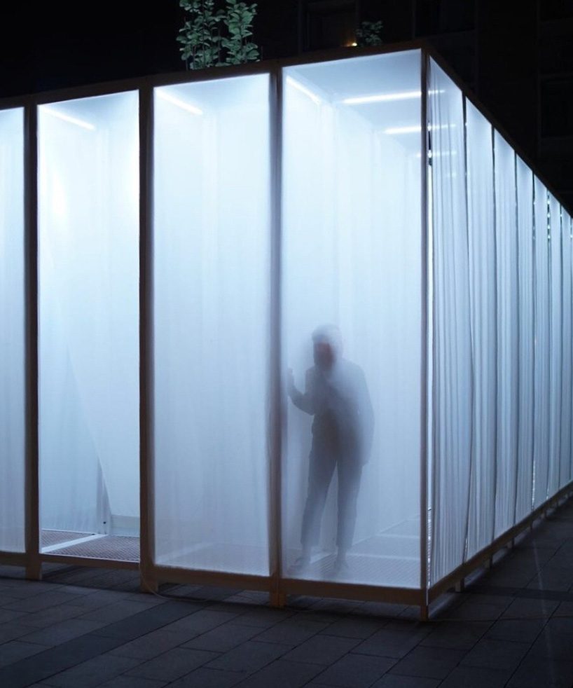 superimpose wraps beijing's CO2 pavilion in translucent white screens and smoke