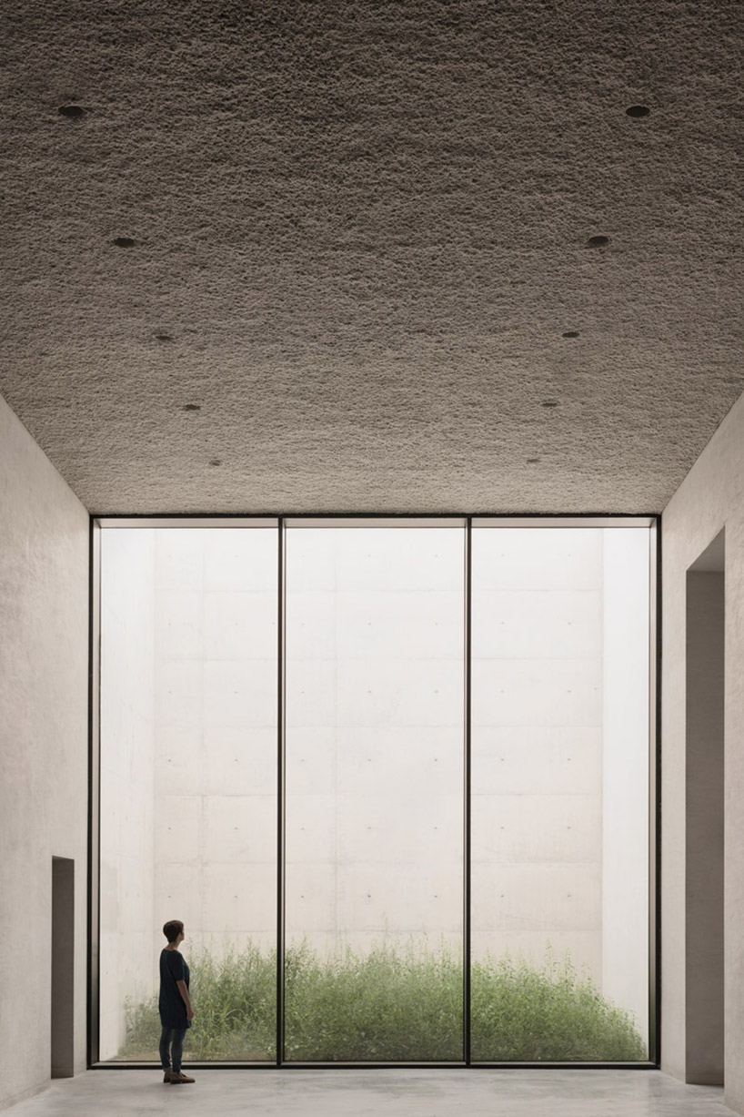 KAAN architecten's crematorium siesegem in belgium is a peaceful oasis for reminiscence designboom