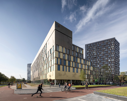 schmidt hammer lassen connects dutch university's facilities with crisscrossing stairways