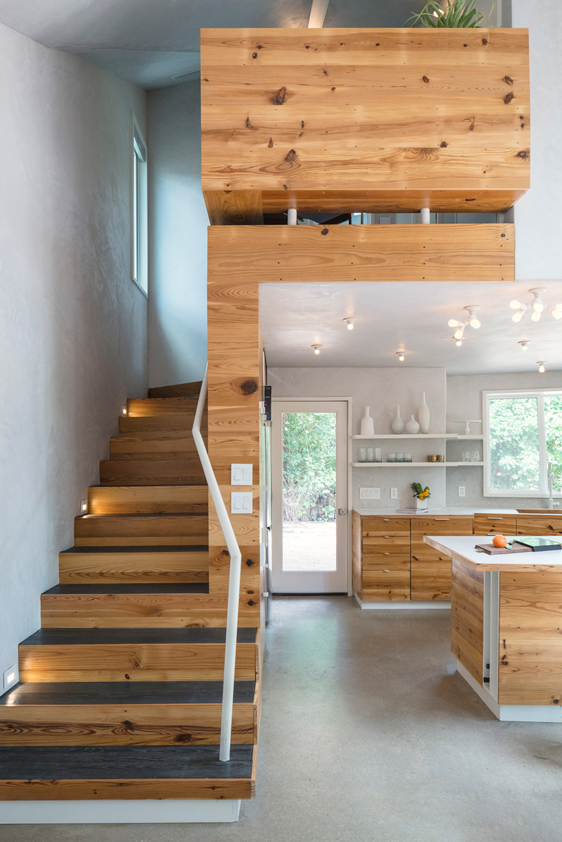 studio 512 clads the angled walls of this texas guesthouse in reclaimed cedar shakes - 6