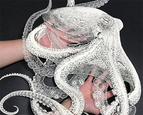 masayo fukuda cuts intricate kirie octopus from single piece of paper