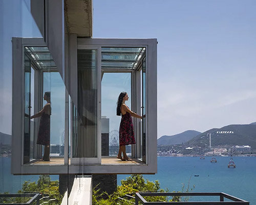 MM++ architects' villa in vietnam uses retractable glass loggia for unique ocean view