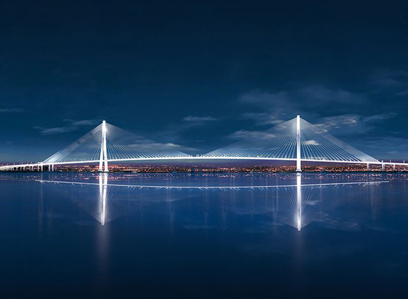 the bridge is designed as a gentle curve, anchored at each bank by