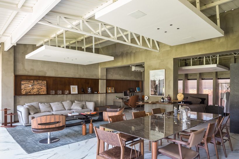  debaixo do bloco transforms part of an oscar niemeyer building into 68 sqm apartment