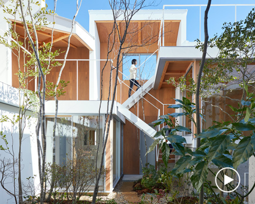 tomohiro hata blurs boundaries between interiors and courtyard of the loop terrace house