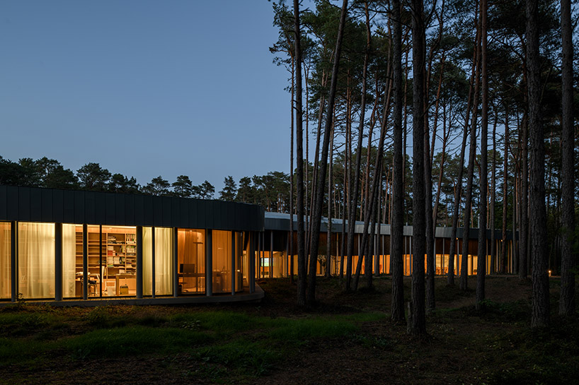 nieto sobejano nestles arvo pärt centre in a dense estonian forest of pine trees designboom