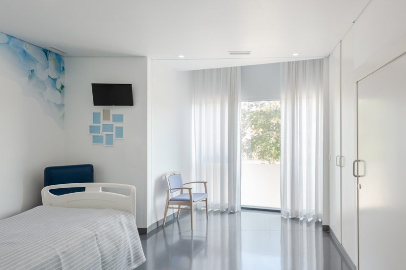 nuno piedade alexandre projects rooms outward to form elderly care center in portugal