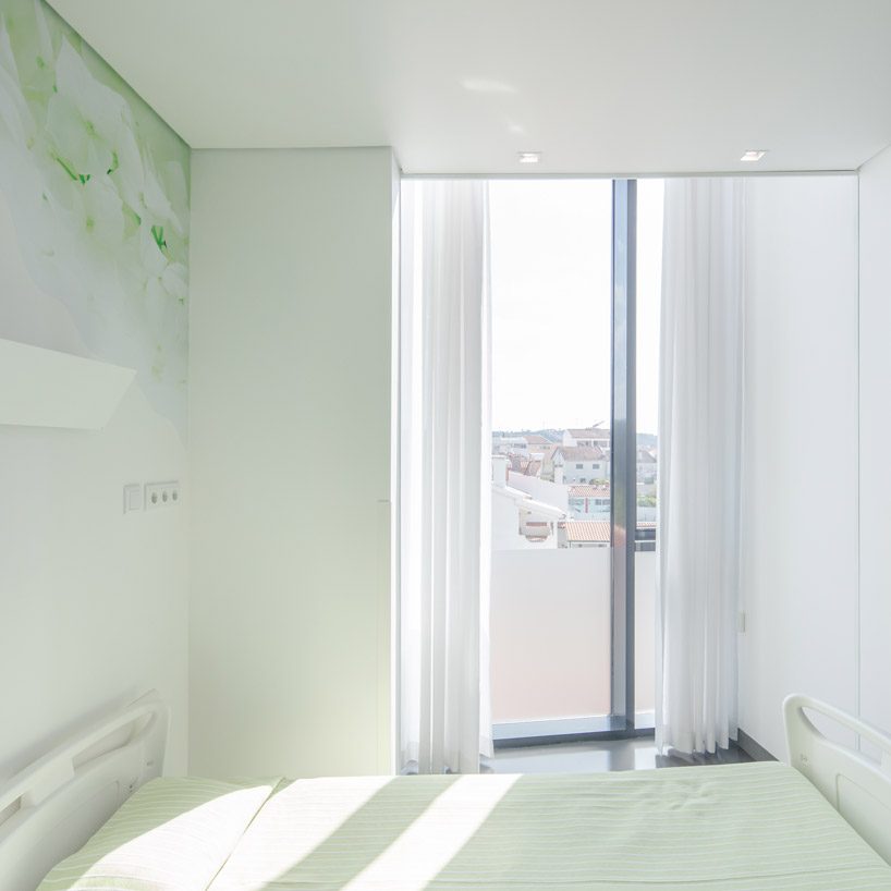 nuno piedade alexandre projects rooms outward to form elderly care center in portugal