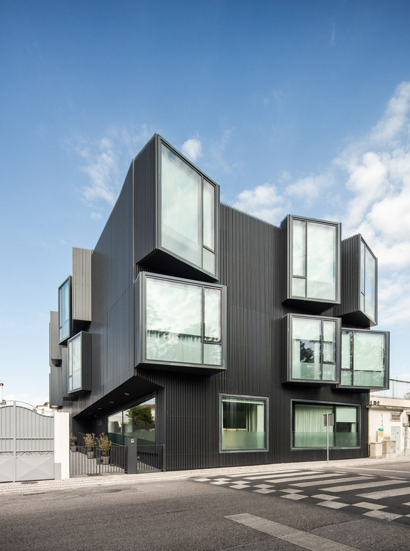 nuno piedade alexandre projects rooms outward to form elderly care center in portugal