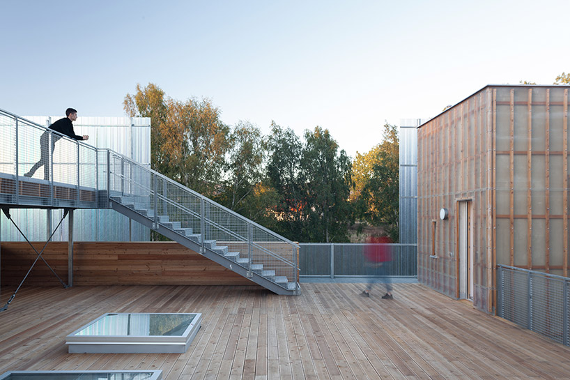 petr stolín builds transparent kindergarten of glass fiber in the czech republic - 11