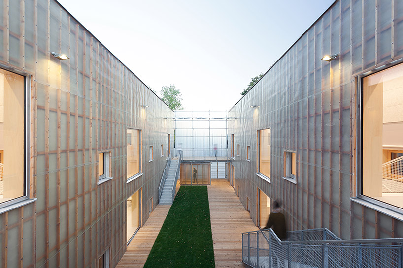 petr stolín builds transparent kindergarten of glass fiber in the czech republic - 12