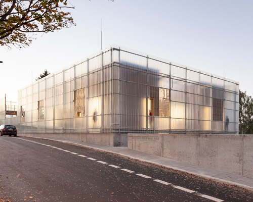 petr stolín builds transparent kindergarten of glass fiber in the czech republic