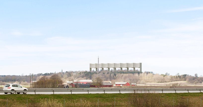 white arkitekter forms water tower in the shape of an elongated wave in varberg