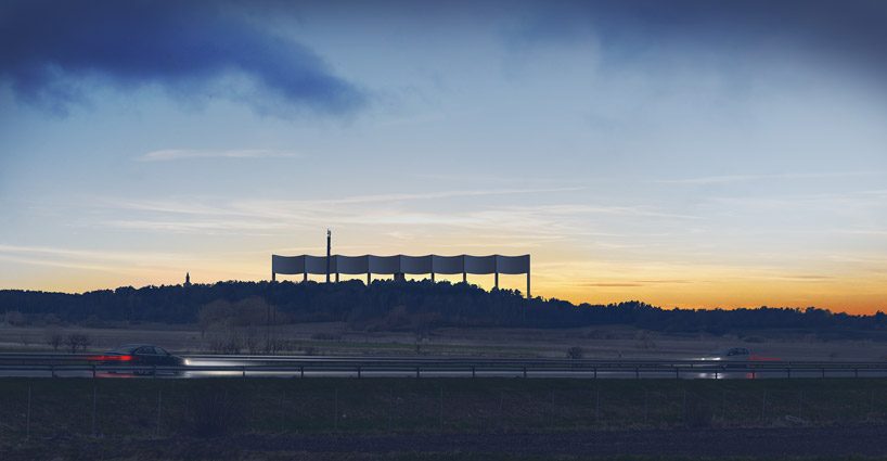 white arkitekter forms water tower in the shape of an elongated wave in varberg