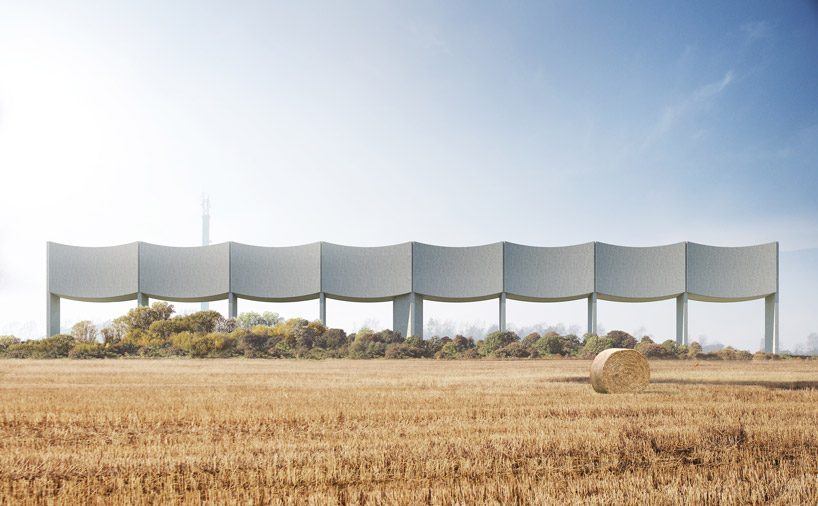 white arkitekter forms water tower in the shape of an elongated wave in varberg