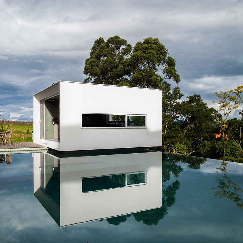 FGMF arquitetos cantilevers white volumes in sao paulo's neblina house designboom