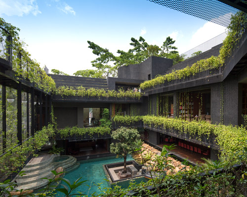 CHANG architects creates stepped garden on the roof of this house in singapore