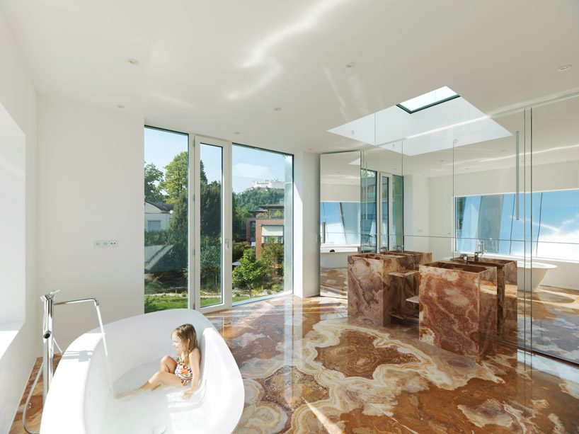 peter ebner combines metal and stucco façades for gestüthalle in salzburg designboom